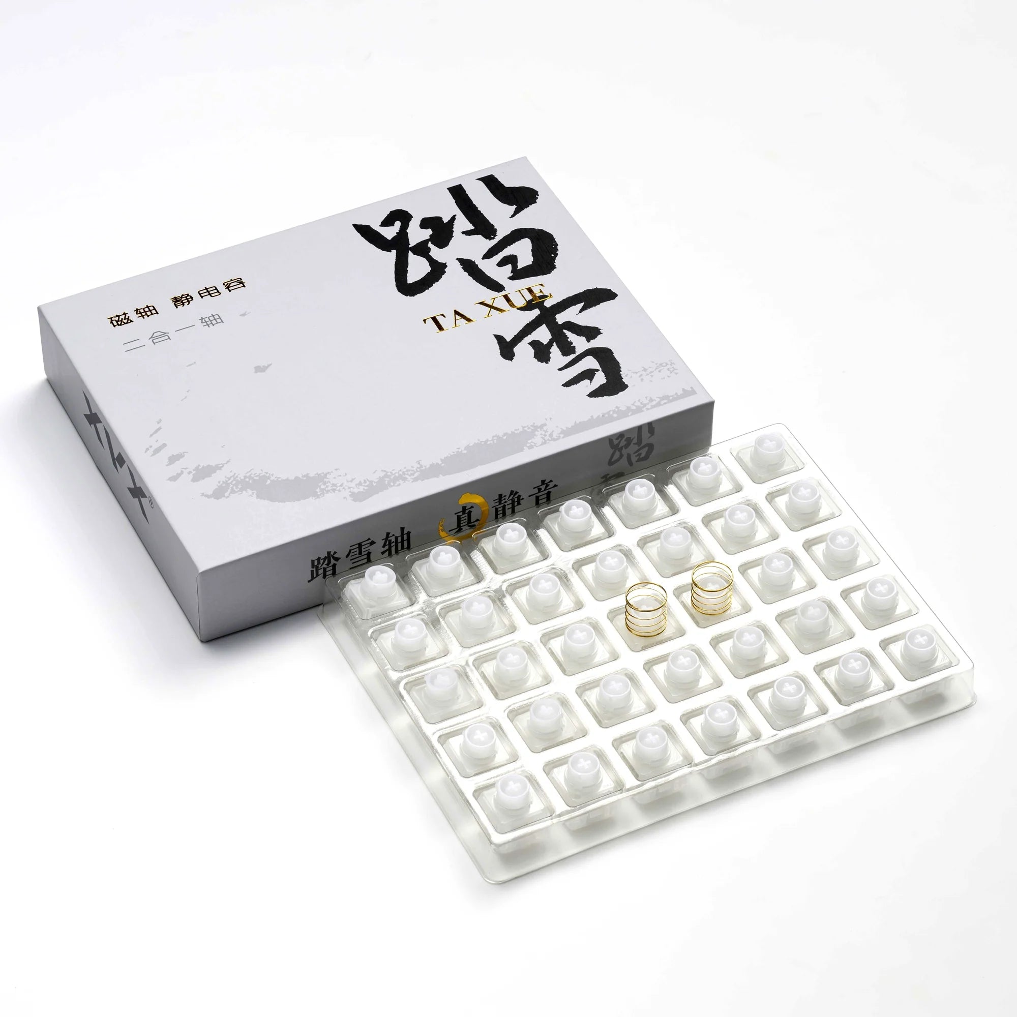 XVX Whisper switch packaging — 35-pack tray with two spare gold spacebar springs in presentation box