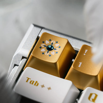 XVX Stained Glass artisan keycap close-up — moissanite gemstone accent with holographic cathedral pattern